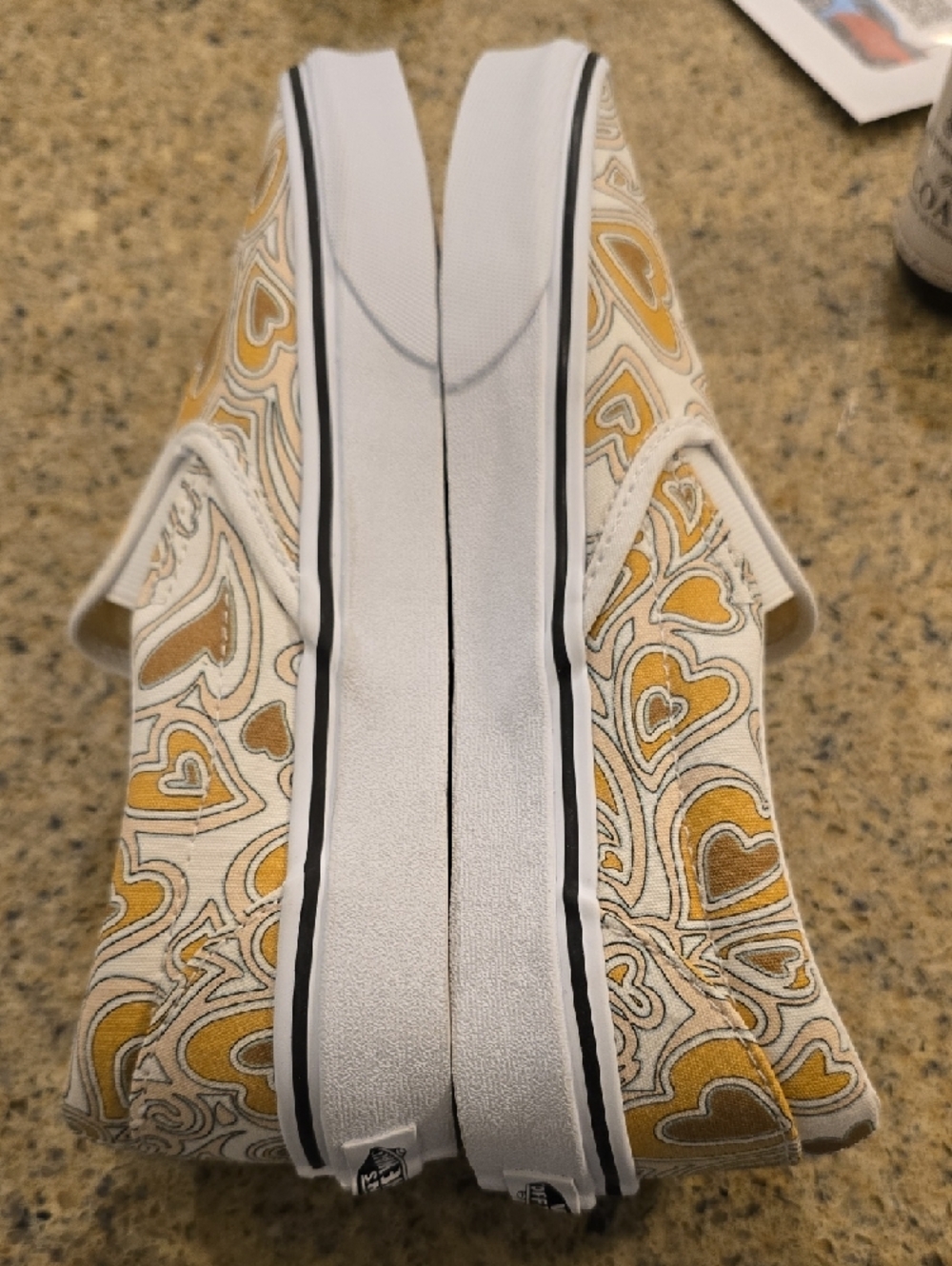 Vans White Canvas Slip-Ons with Yellow Heart Swirl Print - Picture 4 of 8